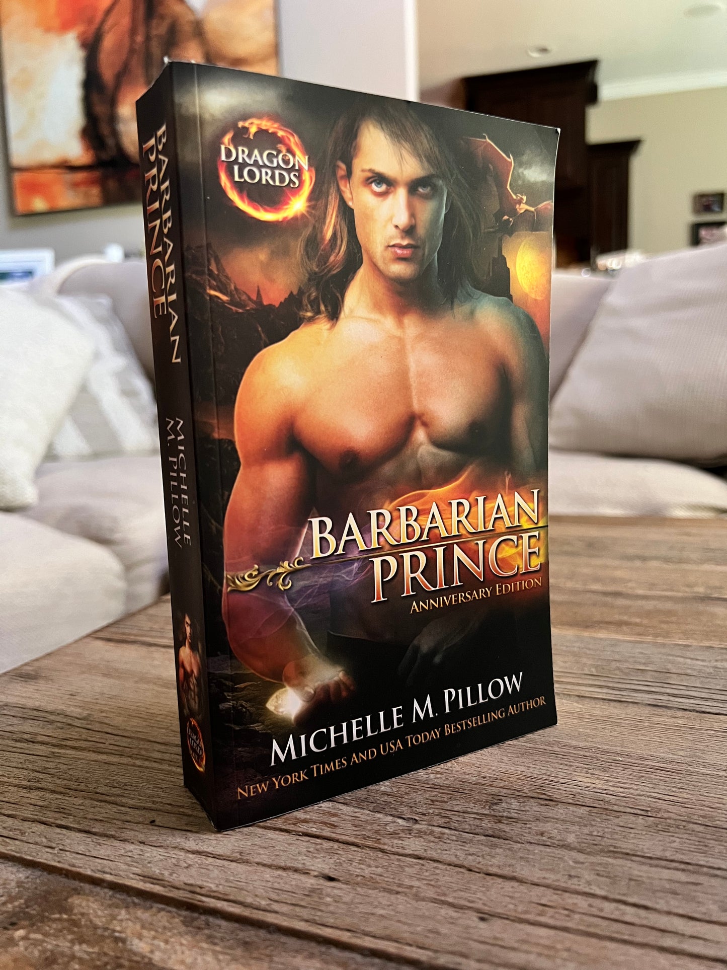 Barbarian Prince paperback book on a coffee table