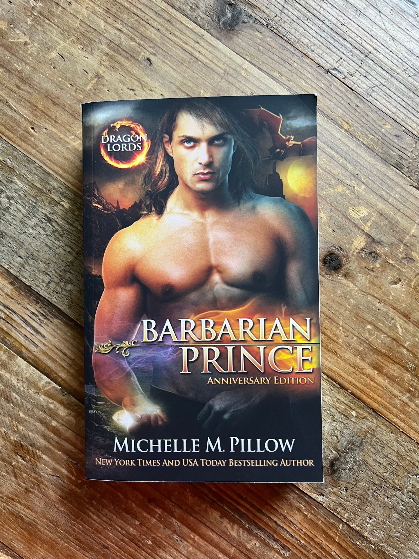 Barbarian prince paperback book laying on a table