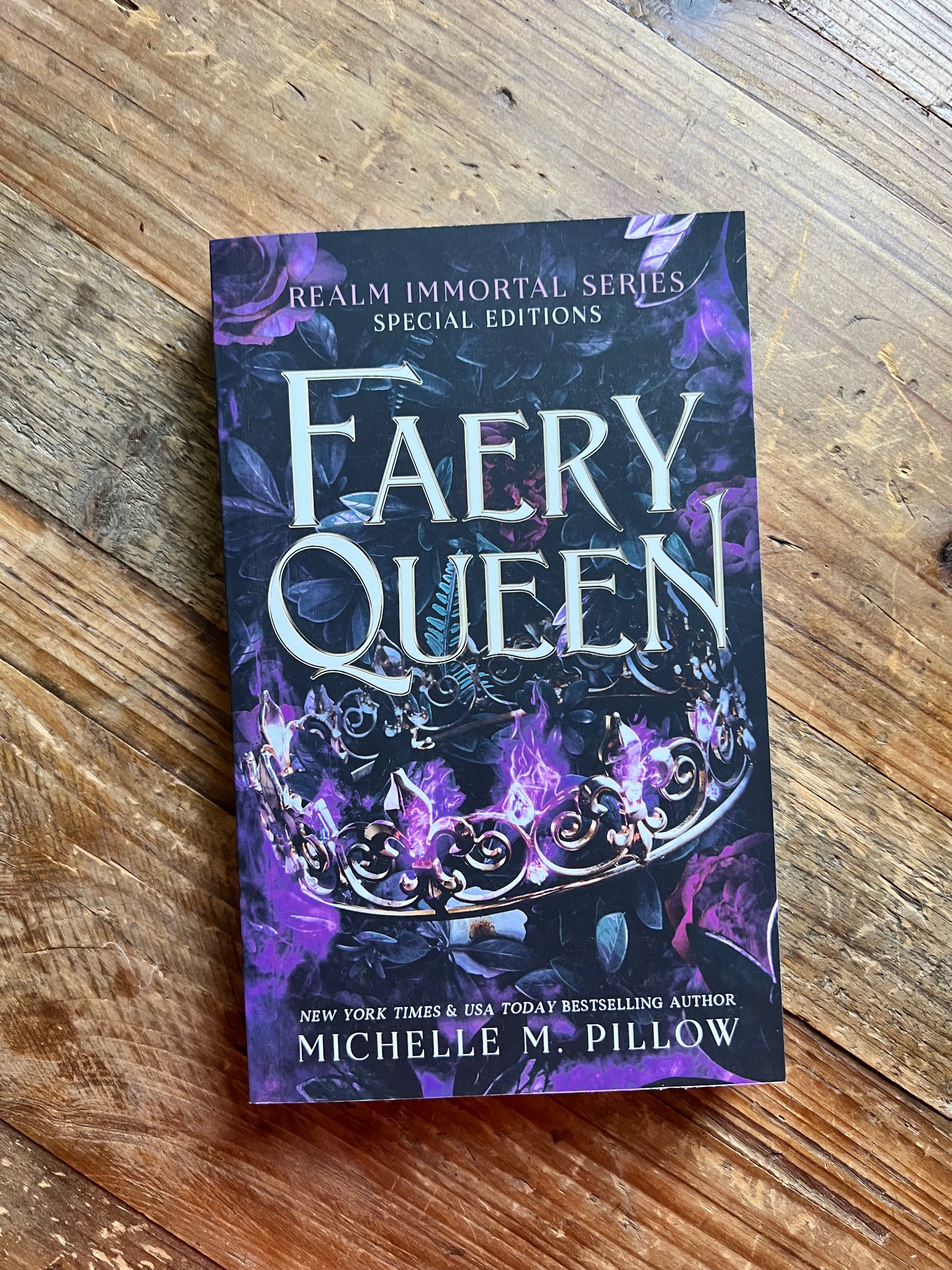 Faery Queen paperback on a table