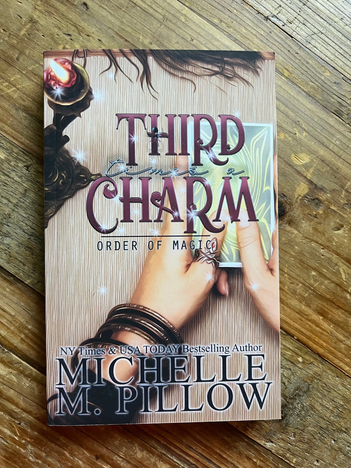 Third Time's a Charm paperback on a table.